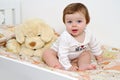 Baby with plush dog Royalty Free Stock Photo