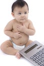 Baby with pocket calculator Royalty Free Stock Photo