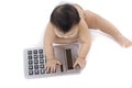 Baby with pocket calculator Royalty Free Stock Photo