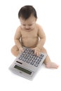 Baby with pocket calculator Royalty Free Stock Photo