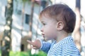 Baby pointing at the park Royalty Free Stock Photo