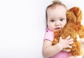 Baby portrait on white empty copy space,child with toy,cute girl portrait