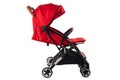 Baby pram, modern red stroller isolated on white with clipping path Royalty Free Stock Photo