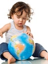 Baby with puzzle globe. Royalty Free Stock Photo