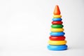 Baby pyramid toy on a white background with copy space