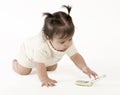Baby reaching for cell phone Royalty Free Stock Photo