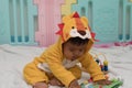 Baby reading the book in room Royalty Free Stock Photo