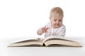 Baby reads a large book Royalty Free Stock Photo