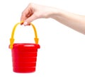 Baby red sandbox bucket toy in hand Royalty Free Stock Photo