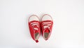 Baby red sneakers isolated on white background. baby shoes Royalty Free Stock Photo