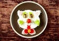 Baby rice dish in the form of a cat.