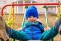Baby rides a swing Royalty Free Stock Photo