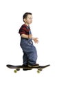 Baby riding a skateboard Royalty Free Stock Photo