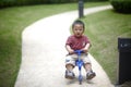 Baby riding tricycle Royalty Free Stock Photo