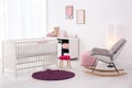 Baby room interior with comfortable crib Royalty Free Stock Photo