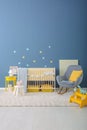 Baby room interior with crib and rocking chair Royalty Free Stock Photo