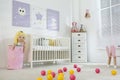 Baby room interior with cute posters and crib Royalty Free Stock Photo