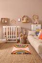 Baby room interior with stylish furniture and comfortable crib Royalty Free Stock Photo