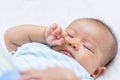 Baby rubbing it`s eyes, Royalty Free Stock Photo