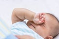 Baby rubbing it`s eyes, Royalty Free Stock Photo