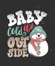 Baby it`s cold outside. Hand drawn calligraphy for Christmas and New Year holiday, dark background. Royalty Free Stock Photo