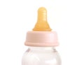 Baby's feeding bottle and a teat Royalty Free Stock Photo