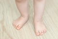 Baby`s feet, first step, close up