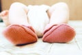 Baby's feet in pink socks Royalty Free Stock Photo