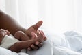 Baby`s foot of an African American baby black skin newborn is 12-day- old Royalty Free Stock Photo