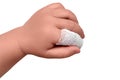 Baby s hand with a bandaged finger on a isolated white background, co Royalty Free Stock Photo