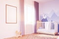 Baby`s room with a crib and a poster, toned Royalty Free Stock Photo