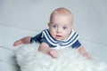 Baby sailor on the white pillow