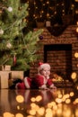 Baby Santa Claus celebrates Christmas