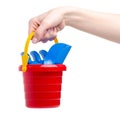 Baby set red sandbox bucket shovel rake toy in hand Royalty Free Stock Photo