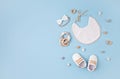 Baby shoes and teethers. Organic newborn accessories, branding, small business idea Royalty Free Stock Photo