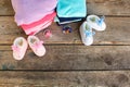 Baby shoes, clothing and pacifiers pink and blue Royalty Free Stock Photo