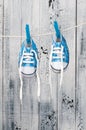 Baby shoes hanging on the clothesline. Royalty Free Stock Photo