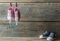 Baby shoes hanging on the clothesline. Royalty Free Stock Photo