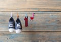 Baby shoes hanging on the clothesline. Royalty Free Stock Photo