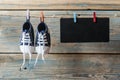 Baby shoes hanging on the clothesline. Royalty Free Stock Photo