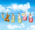 Baby shoes, pacifier and teddy bear on clothesline Royalty Free Stock Photo