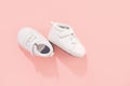 Baby shoes on pink background Royalty Free Stock Photo