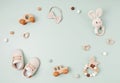 Baby shoes and teethers. Organic newborn accessories, branding, small business idea Royalty Free Stock Photo