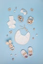 Baby shoes and teethers. Organic newborn accessories, branding, small business idea Royalty Free Stock Photo