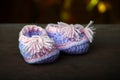 Baby shoes wooden table Royalty Free Stock Photo