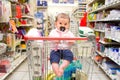 Baby shopping cart newborn supermarket Royalty Free Stock Photo