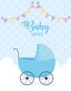 Baby shower, blue pram clouds pennants dotted background