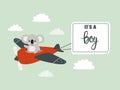 Baby shower boy greeting card. Cute koala pilot on airplane Royalty Free Stock Photo