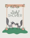 Baby shower card with cute raccoons couple