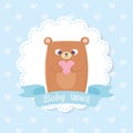 Baby shower, cute teddy bear with heart ribbon decoration Royalty Free Stock Photo